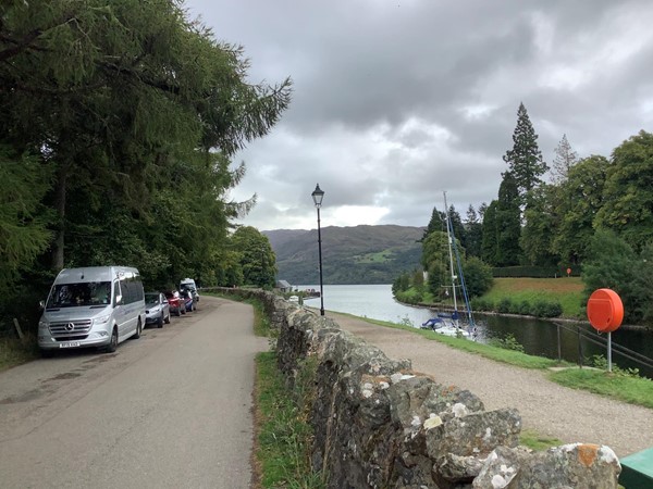 There is a car park on the edge of the village, but if you can, try to park on the driveway alongside the Caledonian canal, as you can see on our photo. On the opposite bank, stands the grounds of the Old Abbey, now beautifully converted into the Highlands Club Scotland apartments.