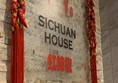 Door way sign for Sichuan House,