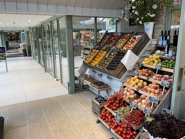 Image of fruit displayed outside a building