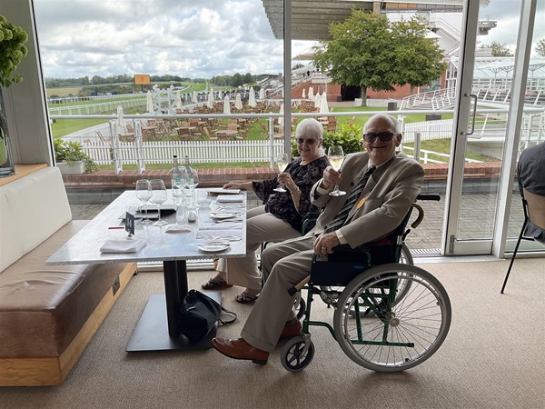 Image of two people sat at a table