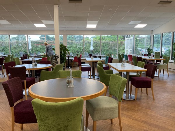 Image of tables and chairs in a room