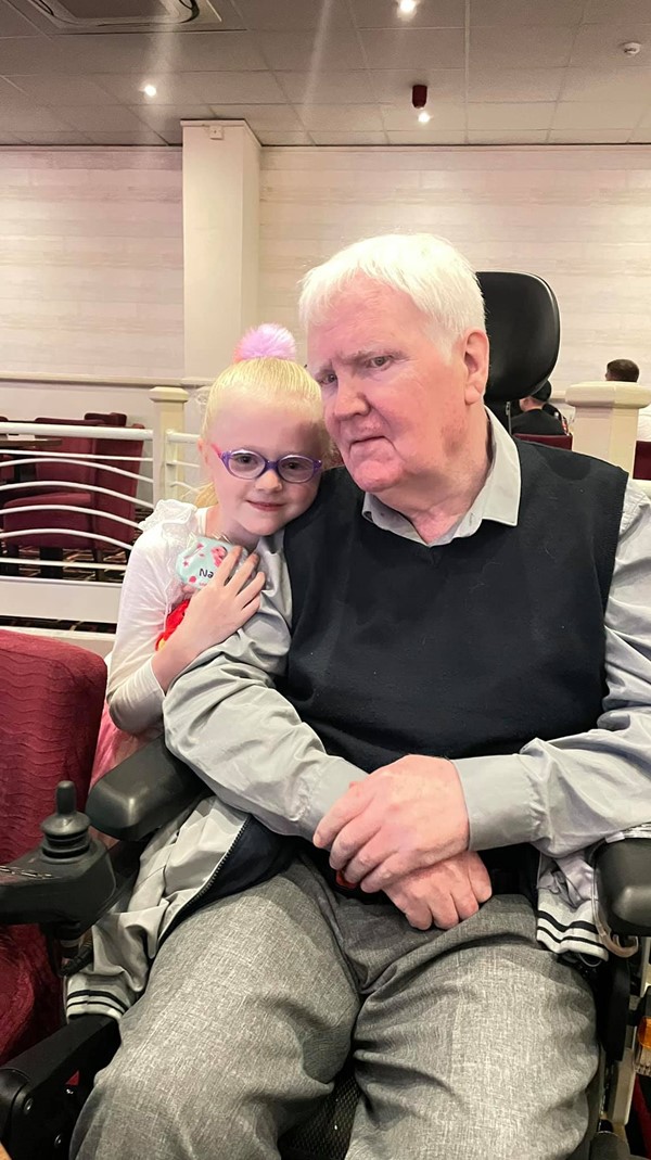 My grandaughter with her beloved grandad in Chesil Vista`s club house.
