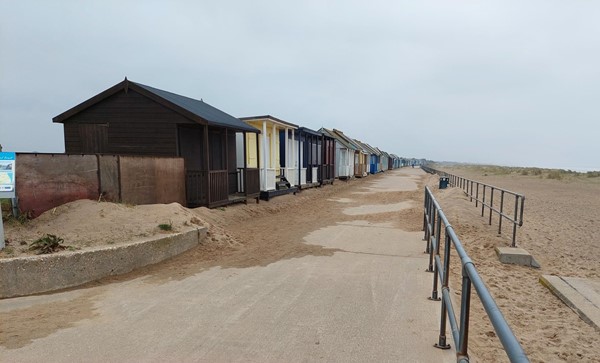 Beach huts and path