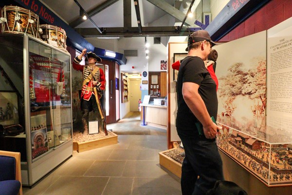 First section of museum with path going through and exhibits on either side.