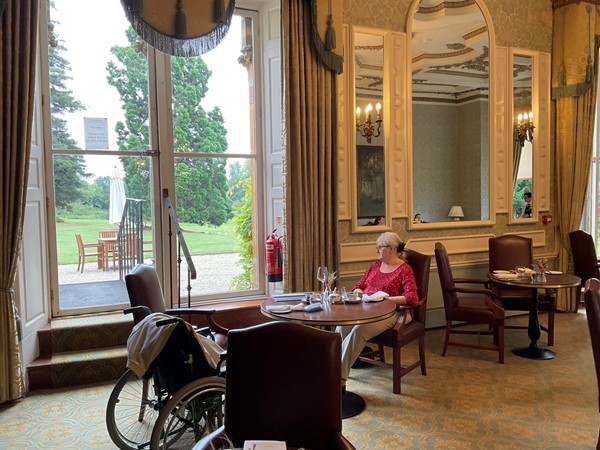 Image of a person sitting at a table