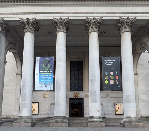 Image of a building with columns and banners