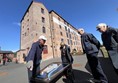 Image of people in front of a building