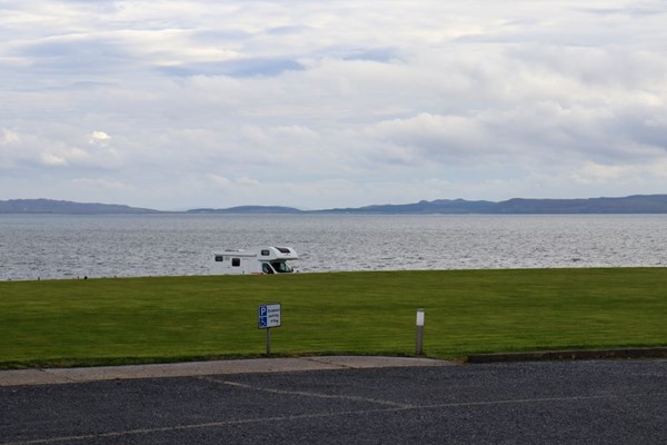 Picture of a camper van by the sea