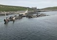 Looking towards the island of Mousa & the pier with poor accessibility to get ashore onto the islands the