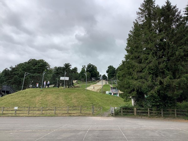 Ski slope behind netting