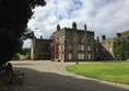 Level access, compacted gravel, benches and ramped castle entrance.