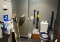 Image of a cluttered accessible toilet