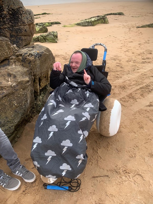 Picture of a person in a beach wheelchair