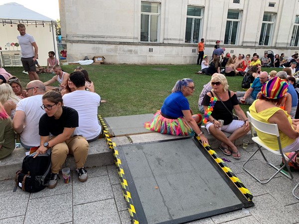 Ramps onto grassy areas for wheelchair users.