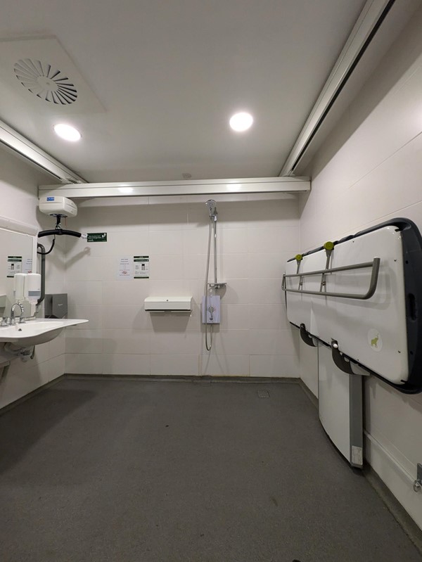 Image of the adjustable change bed  in the Changing Places toilet