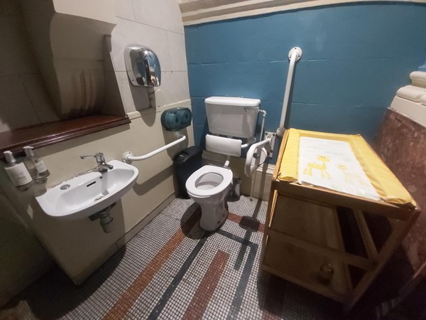 Image of a bathroom with a sink and toilet