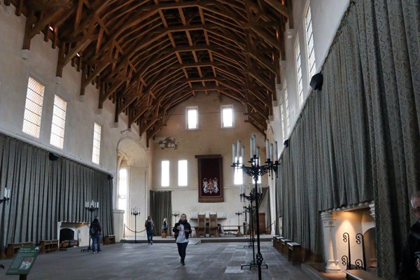 The great hall with lots of space and a small ramp at the end to get up to the dinner table area.