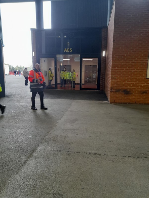 Man in an orange hi viz jacket