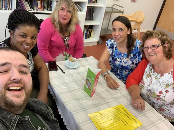 Photo shows myself and a group of friends sat around a table in the FVSC cafe after our lunch