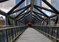 Image of the walkway between Deansgate station and the metro link