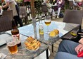 Image of a table with food and drinks on it