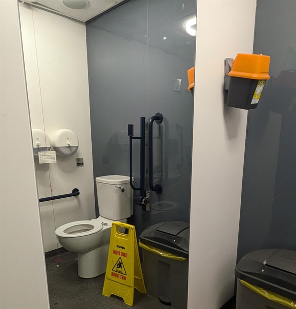 Image showing the accessible toilet in the mirror