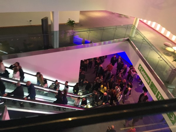 Escalators down to venue.