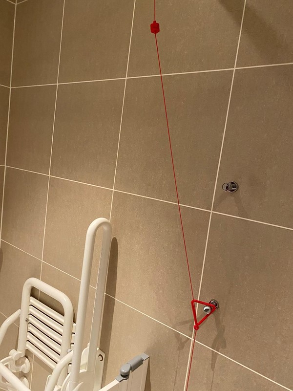 Red cord in accessible toilet