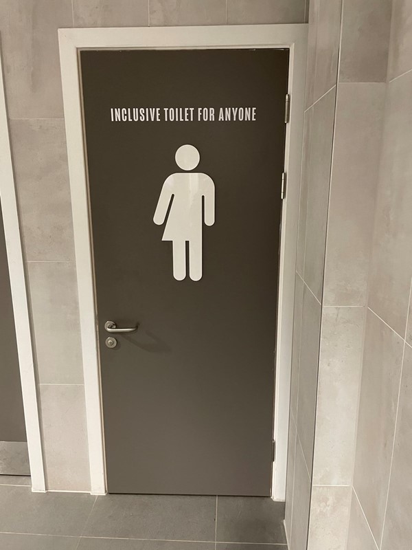 Inclusive toilet door